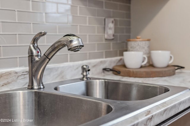 details with decorative backsplash and sink