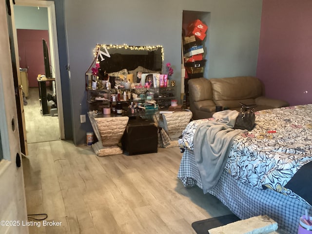 bedroom featuring light wood-type flooring