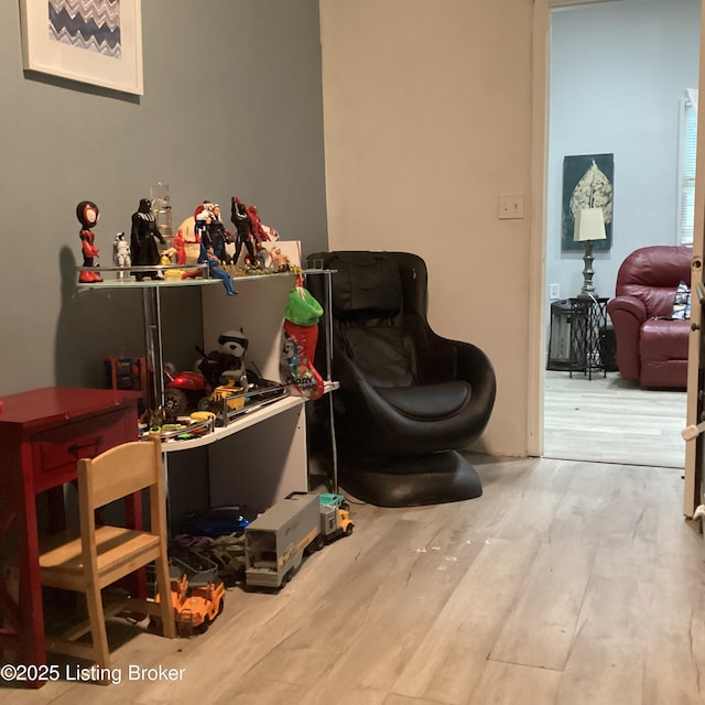 rec room with wood finished floors