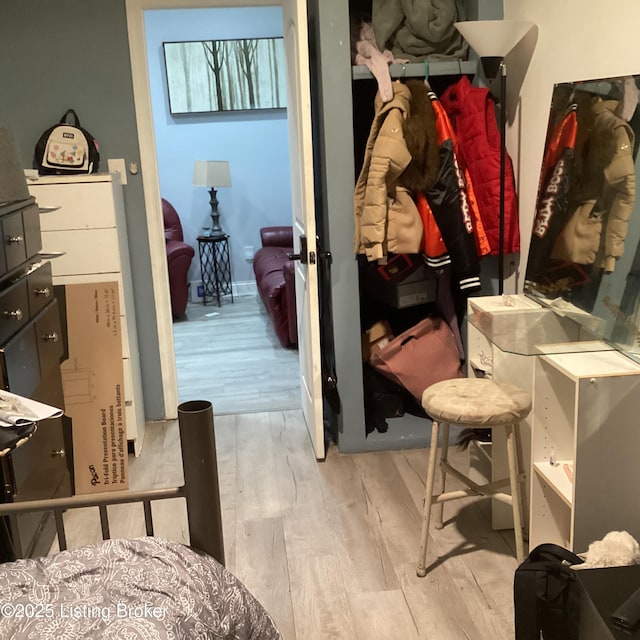 bedroom with wood finished floors
