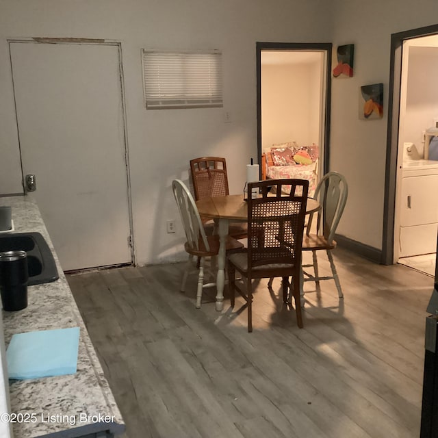 dining room with dark wood-type flooring