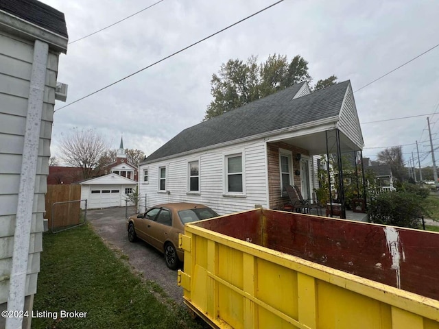 view of side of property with a porch