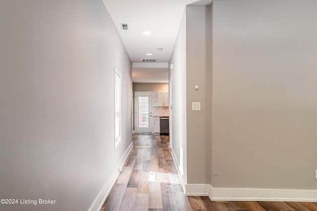 hallway featuring hardwood / wood-style floors