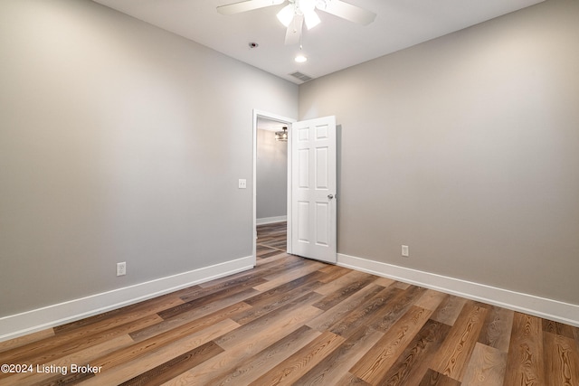 unfurnished room featuring wood-type flooring and ceiling fan