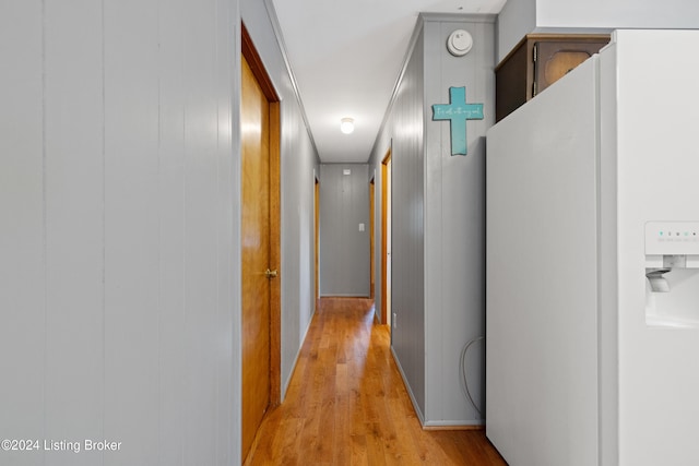 hall with light hardwood / wood-style floors