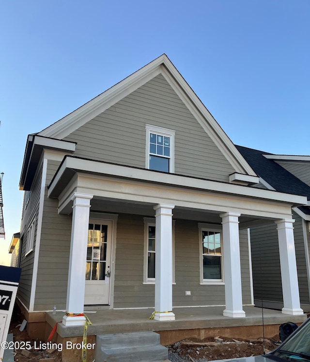 neoclassical home with a porch