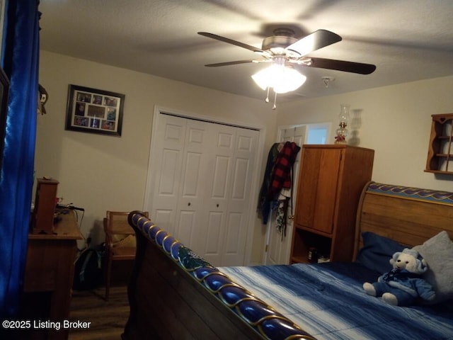 bedroom with ceiling fan and a closet