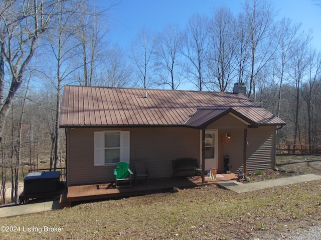 view of front of home with a wooden deck