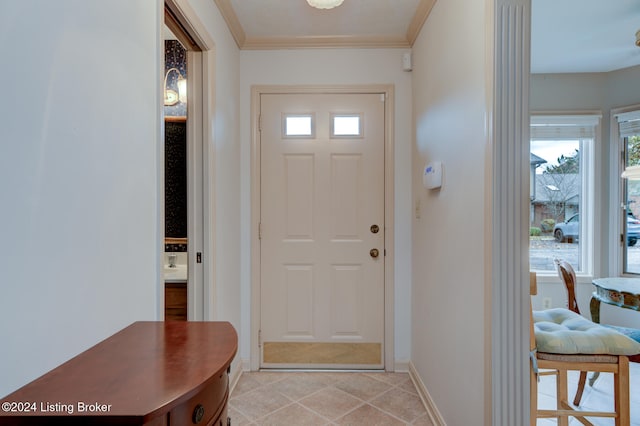 doorway with plenty of natural light and ornamental molding