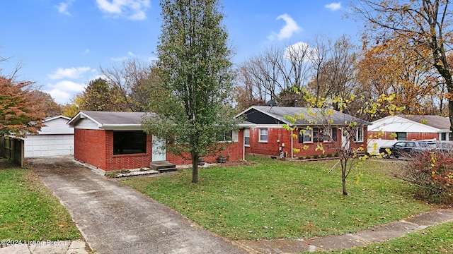 view of front facade with an outbuilding and a front yard