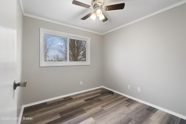 unfurnished room with ceiling fan, dark wood-type flooring, and ornamental molding