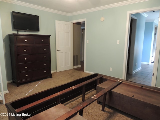 bedroom featuring light tile patterned floors and ornamental molding