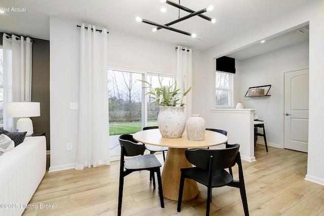 dining room featuring light wood-type flooring