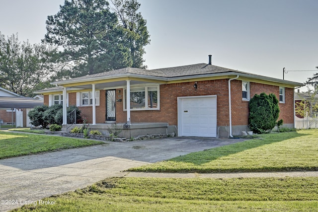 ranch-style house featuring a garage and a front yard