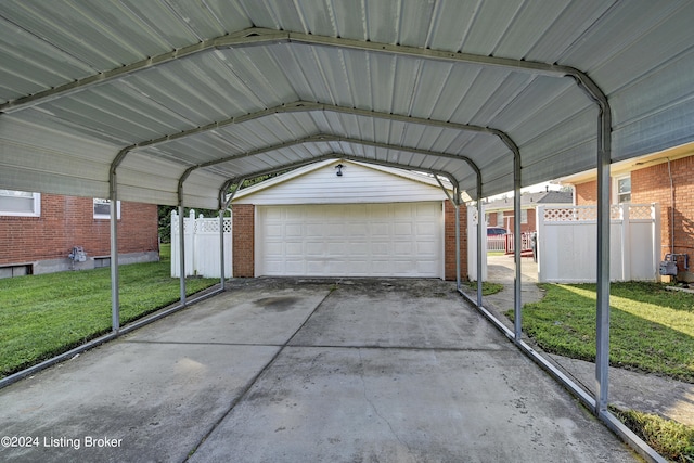 exterior space featuring a carport and a lawn