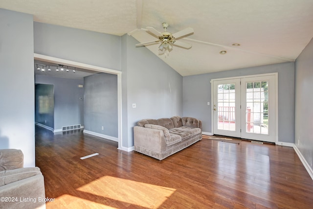 unfurnished living room featuring a textured ceiling, ceiling fan, hardwood / wood-style floors, and vaulted ceiling