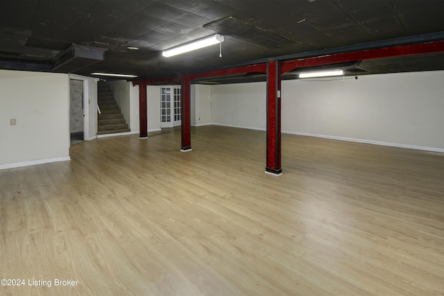 basement with light wood-type flooring