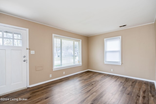 entrance foyer with dark hardwood / wood-style flooring