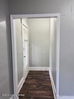 hallway featuring dark hardwood / wood-style floors