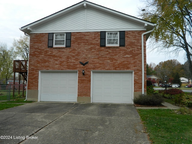 view of property exterior featuring a garage