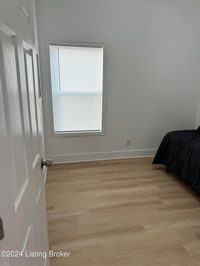 bedroom featuring light hardwood / wood-style flooring