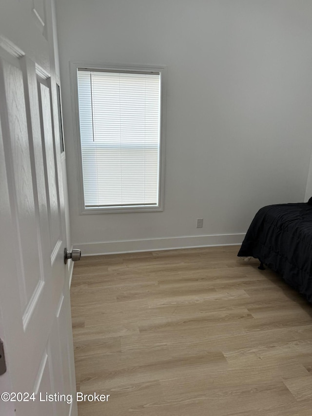 445 Marret Ave, Louisville, KY 40203 - bedroom featuring light wood finished floors and baseboards
