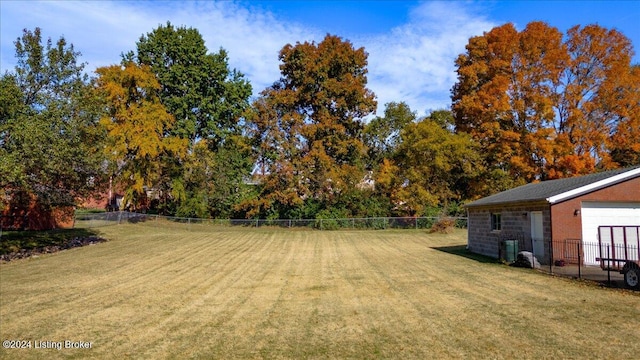 view of yard with central AC unit