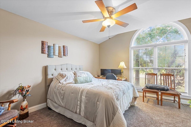 bedroom with carpet floors, vaulted ceiling, and ceiling fan