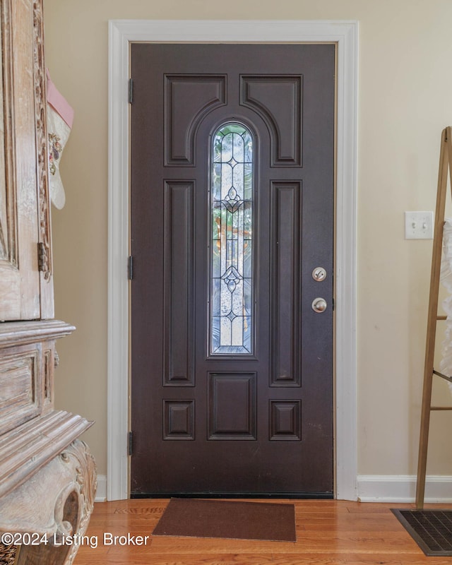 entrance foyer featuring hardwood / wood-style floors