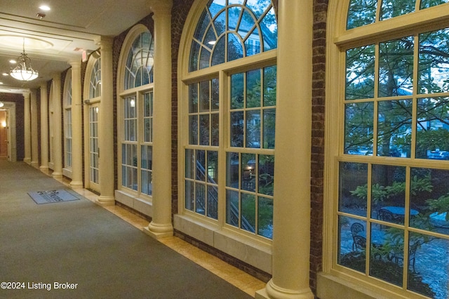 entryway with ornate columns