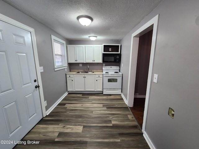 kitchen with electric stove, white cabinetry, sink, and dark hardwood / wood-style floors