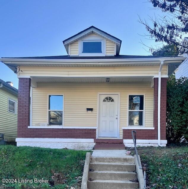 bungalow featuring a porch