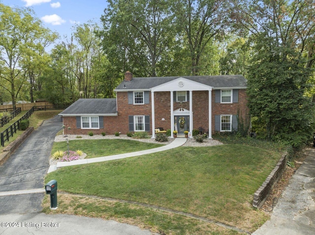 view of front of home with a front lawn