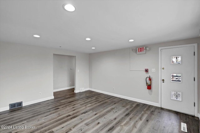 entrance foyer featuring wood-type flooring