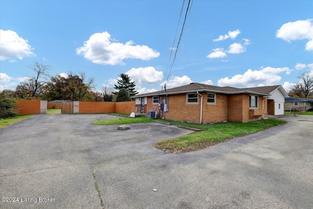 view of property exterior with cooling unit