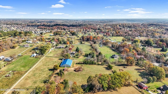 birds eye view of property featuring a rural view