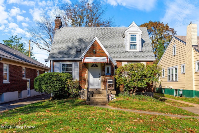 view of front of home with a front yard