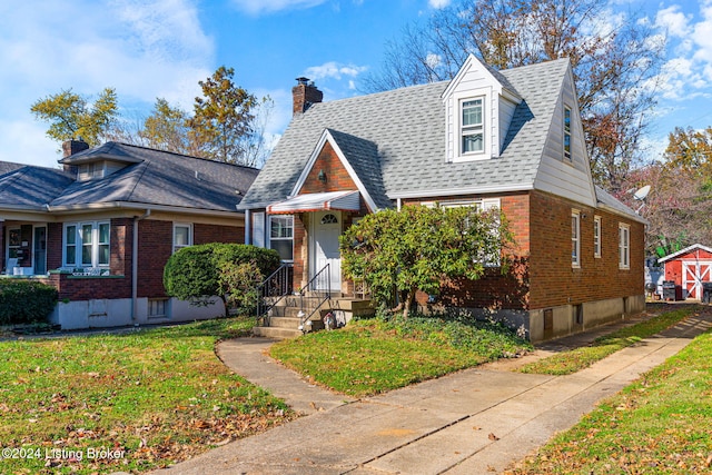 view of front of property featuring a front yard