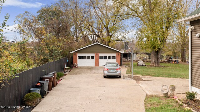 garage with a yard