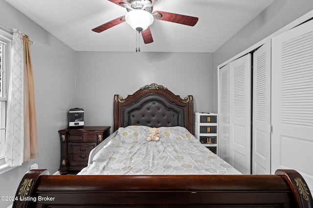 bedroom with a closet and ceiling fan