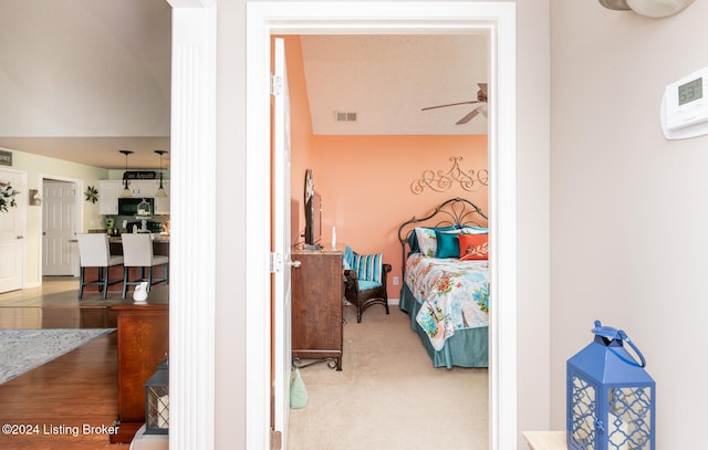 bedroom featuring ceiling fan and hardwood / wood-style floors