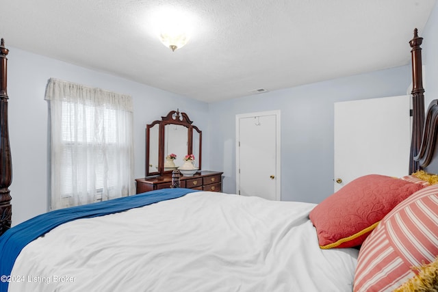 bedroom with a textured ceiling