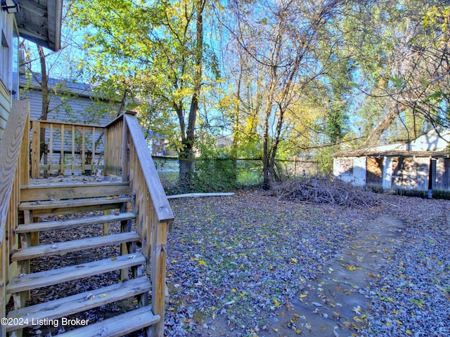 view of yard featuring a deck