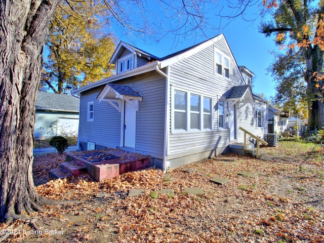 exterior space featuring cooling unit