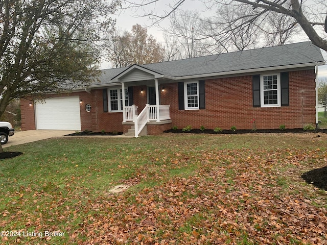 ranch-style home with a garage and a front lawn