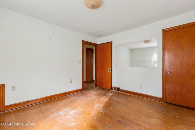 unfurnished bedroom featuring light hardwood / wood-style floors