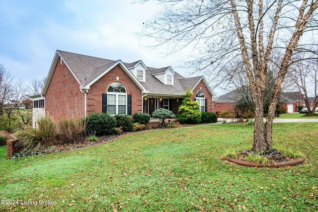 view of front of home with a front lawn