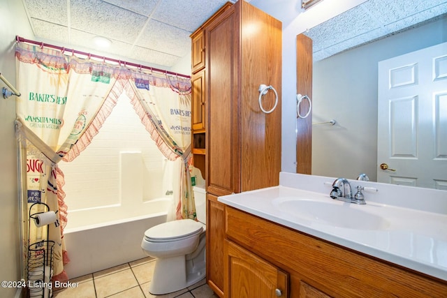 full bathroom with tile patterned flooring, shower / tub combo, vanity, and toilet