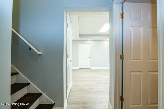 corridor featuring light hardwood / wood-style floors