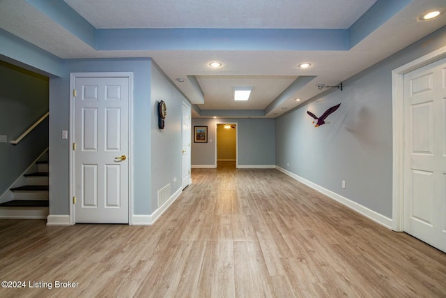 basement featuring light wood-type flooring